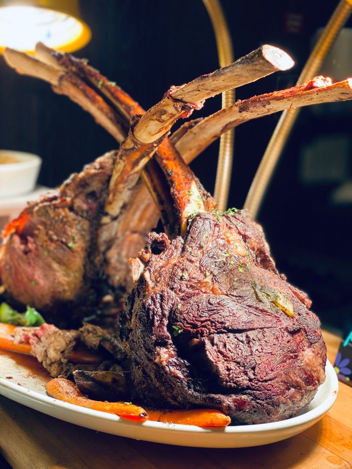 Juicy tomahawk steaks cooked to perfection for gourmet dining.